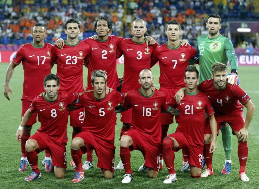Portugal's players pose for a team photo before the start of their Group B Euro 2012 soccer match against Netherlands at the Metalist stadium in Kharkiv