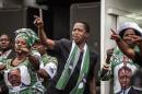 Incumbent Zambian President Edward Lungu (C) during his closing campaign rally in Lusaka on August 10, 2016
