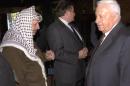 FILE - In this Oct. 21, 1998 file photo, Israeli Foreign Minister Ariel Sharon, right, stands near but does not look at, or shake hands with, Palestinian leader Yasser Arafat at Wye Plantation, Maryland. Before becoming a candidate, Sharon proudly boasted he had never shaken hands with Arafat, and called the Palestinian leader a "murderer and a liar" in an interview with the New Yorker magazine. Sharon, the hard-charging Israeli general and prime minister who was admired and hated for his battlefield exploits and ambitions to reshape the Middle East, died Saturday, Jan. 11, 2014. The 85-year-old Sharon had been in a coma since a debilitating stroke eight years ago. (AP Photo/Israel Government Press Office, File)