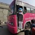 An activist dressed as Indian Prime Minister Manmohan Singh stands on a pink bus meant to spread awareness on violence against women, in New Delhi, India, Thursday, Jan. 24, 2013. The trial of five men accused of the rape and murder of a young woman on a moving bus in New Delhi last month was set to begin Thursday in a special fast-track court set up after the attack ignited outrage and questions over the treatment of women in the country's justice system. (AP Photo /Manish Swarup)