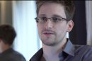 This photo provided by The Guardian Newspaper in London shows Edward Snowden, who worked as a contract employee at the National Security Agency, on Sunday, June 9, 2013, in Hong Kong. NSA leaker Edward Snowden claims the spy agency gathers all communications into and out of the U.S. for analysis, despite government claims that it only targets foreign traffic. (AP Photo/The Guardian, Glenn Greenwald and Laura Poitras)