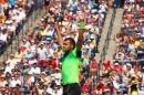 Jo-Wilfried Tsonga of France celebrates his quarterfinals win against Andy Murray of Great Britain during the Rogers Cup on August 8, 2014 in Toronto, Canada