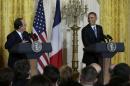 U.S. President Obama and French President Hollande address joint news conference at the White House in Washington