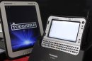 Panasonic Toughpad and handheld Toughbook model are displayed at the company's IT products headquarters in Moriguchi