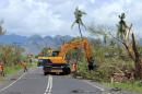 This photo released on February 22, 2016 by the Fiji government shows an excavator clearing debris following Cyclone Winston in Fiji's western division