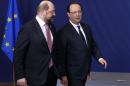 European Parliament President Schulz talks with France's President Hollande during a European Union leaders summit in Brussels