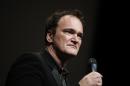 FILE - In this Oct. 18, 2013 file photo, director Quentin Tarantino delivers a speech before receiving the Lumiere Award during the 5th edition of the Lumiere Festival, in Lyon, central France. Tarantino sued Gawker Media LLC on Monday, Jan. 27, 2014, in Los Angeles for copyright infringement over the site's posting of a story that linked to a leaked copy of his script for a planned film called "The Hateful Eight." (AP Photo/Laurent Cipriani, File)