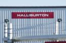 A Halliburton facility sits behind a barbed wire fence on the outskirts of Williston