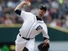 Detroit Tigers starting pitcher Doug Fister throws against the Kansas City Royals in the first inning of a baseball game in Detroit, Thursday, Sept. 27, 2012.  (AP Photo/Paul Sancya)