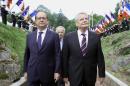 French President Francois Hollande (left) and his German counterpart Joachim Gauck arrive for a ceremony at the WWI Hartmannswillerkopf National Monument, or Vieil Armand, in Wattwiller, northeastern France, on August 3, 2014