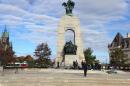 Police guard the scene of a shooting at the National War Memorial in Ottawa, Canada