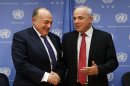Palestinian Finance Minister Shukri Bishara, left, shakes hands with Israeli Foreign Minister Yuval Steinitz after a press conference regarding a meeting of the Ad Hoc Liaison Committee during the 68th session of the United Nations General Assembly at U.N. headquarters, Wednesday, Sept. 25, 2013. (AP Photo/Jason DeCrow)