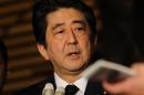 Japanese Prime Minister Shinzo Abe speaks to reporters after a cabinet meeting at his official residence in Tokyo on January 25, 2015