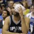 San Antonio Spurs' Tony Parker (9), of France, sits with an ice pack to his left eye after suffering an injury early in the first half of an NBA basketball game against the Dallas Mavericks, Friday, Jan. 25, 2013, in Dallas. Parker continued playing in the game after receiving stitches to the area. (AP Photo/Tony Gutierrez)