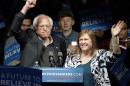 Democratic presidential candidate, Sen. Bernie Sanders, I-Vt., and his wife Jane Sanders, wave after a campaign rally Tuesday, May 3, 2016, in Louisville, Ky. (AP Photo/Charlie Riedel)