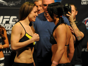 Bantamweights Alexis Davis (L) and Jessica Eye (R) weigh in for UFC 170. (USA TODAY Sports)