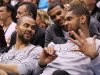 San Antonio Spurs' Tony Parker, left, of France, Tim Duncan, right, and Cory Joseph, center, joke on the bench late in the second half of Game 4 in the first-round NBA basketball playoff series against the Utah Jazz, Monday, May 7, 2012, in Salt Lake City. The Spurs defeated the Jazz 87-81 to take the series 4-0. (AP Photo/Colin E Braley)