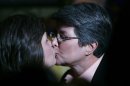 Cindy Meneghin, right, kisses her partner Maureen Kilian, both from Butler, N.J., during a rally at Garden State Equality in Montclair, N.J., hours after a Superior Court Judge ruled that New Jersey is unconstitutionally denying federal benefits to gay couples and must allow them to marry, Friday, Sept. 27, 2013. Meneghin has been with Kilian for 39 years. Judge Mary Jacobson ruled it legal for gay couples to marry in the state beginning Oct. 21, 2013. The ruling comes after a group of gay marriage supporters sued the state in July, days after the U.S. Supreme Court struck down key parts of a law that blocked the federal government from granting benefits to gay couples. (AP Photo/Julio Cortez)