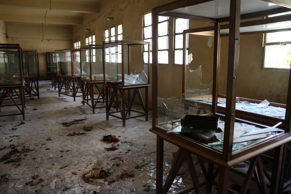 Rows of display cases are broken and empty at the Malawi Antiquities Museum after it was ransacked and looted between the evening of Thursday, Aug. 15 and the morning of Friday, Aug. 16, 2013 in Malawi, south of Minya, Egypt, Saturday, Aug. 17, 2013. The interim Cabinet authorized police to use deadly force against anyone targeting police and state institutions on Thursday. The violence capped off a week that saw more than 700 people killed across the country. (AP Photo/Roger Anis, El Shorouk Newspaper) EGYPT OUT