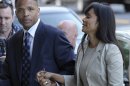 Former Illinois Rep. Jesse Jackson Jr. and his wife, Sandra, arrive at federal court in Washington, Wednesday, Aug. 14, 2013, to learn their fates when a federal judge sentences the one-time power couple for misusing $750,000 in campaign money on everything from a gold-plated Rolex watch and mink capes to vacations and mounted elk heads. (AP Photo/Susan Walsh)