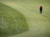 Ernie Els, of South Africa, walks down the first hole during practice for the U.S. Open golf tournament at Merion Golf Club, Wednesday, June 12, 2013, in Ardmore, Pa. (AP Photo/Charlie Riedel)