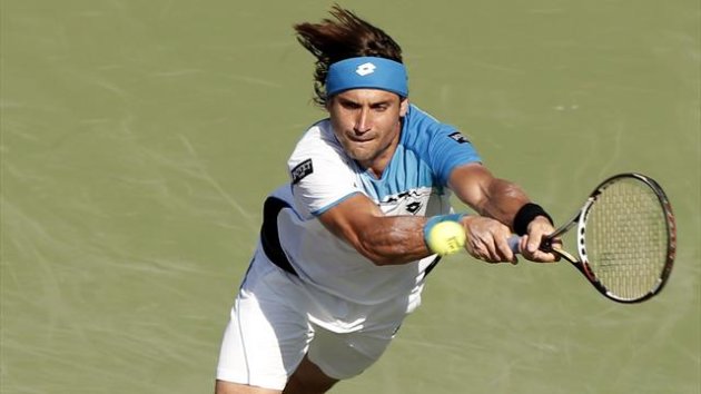 David Ferrer of Spain hits a backhand to Jurgen Melzer of Austria their quarter-final match at the Sony Open tennis tournament in Key Biscayne, Florida March 27, 2013. REUTERS