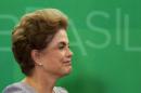 Brazil's President Rousseff smiles as she attends a meeting with jurists at Planalto Palace in Brasilia