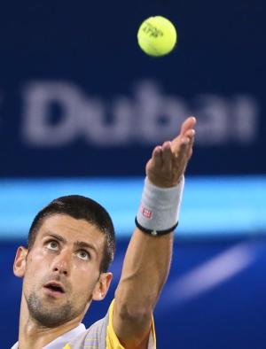 Novak Djokovic serves during his Dubai Open match against&nbsp;&hellip;