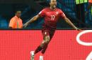 Portugal's Nani celebrates after scoring the opening goal during the group G World Cup soccer match between the USA and Portugal at the Arena da Amazonia in Manaus, Brazil, Sunday, June 22, 2014. (AP Photo/Paulo Duarte)