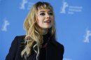 Actress Poots poses during a photocall to promote the movie "The Look of Love" at the 63rd Berlinale International Film Festival in Berlin