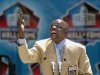 FILE - In this Aug. 3, 2002 file photo, Hall of Fame defensive end Deacon Jones presents the late coach George Allen for enshrinement into the Pro Football Hall of Fame in Canton, Ohio. Jones, the original sackmaster, has died. The Hall of Fame defensive end credited with terming the word sack for how he knocked down quarterbacks, was 74. The Washington Redskins said that Jones died of natural causes at his home in Southern California on Monday night, June 3, 2013. (AP Photo/Mark Duncan, File)