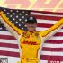 Ryan Hunter-Reay celebrates in victory circle after an IndyCar Series auto race at the Milwaukee Mile in West Allis, Wis., Saturday, June 15, 2013. (AP Photo/Jeffrey Phelps)