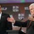 Republican presidential candidates Newt Gingrich,  left, speaks as Mitt Romney,  listens during the CBS News/National Journal foreign policy debate at the Benjamin Johnson Arena, Saturday, Nov. 12, 2011 in Spartanburg, S.C. (AP Photo/Richard Shiro)