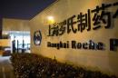 File photo of the logo of Shanghai Roche Pharmaceutical Co. Ltd. outside their headquarters in Shanghai