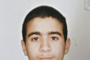 FILE - This undated photo shows Guantanamo detainee Omar Khadr, a Canadian, taken before he was imprisoned in 2002 at the age of 15. A decade after Khadr was pulled near death from the rubble of a bombed-out compound in Afghanistan, the Canadian citizen set foot on Canadian soil early Saturday, Sept. 29, 2012, after an American military flight from the notorious prison in Guantanamo Bay. Khadr pleaded guilty in 2010 to killing a U.S. soldier in Afghanistan and was eligible to return to Canada from Guantanamo Bay last October under terms of a plea deal. Canada's conservative government took almost a year to approve the transfer. (AP Photo/Canadian Press, File)