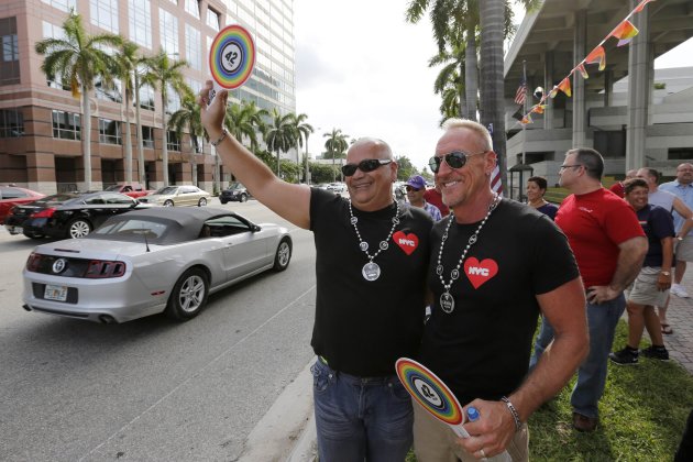 People take part in a gay rights rally following the U.S. Supreme Court strike down of the Defense of Marriage Act, in Fort Lauderdale