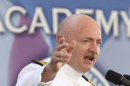 Former astronaut Capt. Mark Kelly speaks during the United States Merchant Marine Academy commencement exercises in Kings Point, N.Y., Monday, June 18, 2012. Kelly, who is an alumnus of the academy, referenced his wife, former Arizona Congresswoman Gabrielle Giffords, during the speech. Kelly said that he and Giffords have dedicated their lives to public service and urged the graduates to do the same. (AP Photo/Seth Wenig)