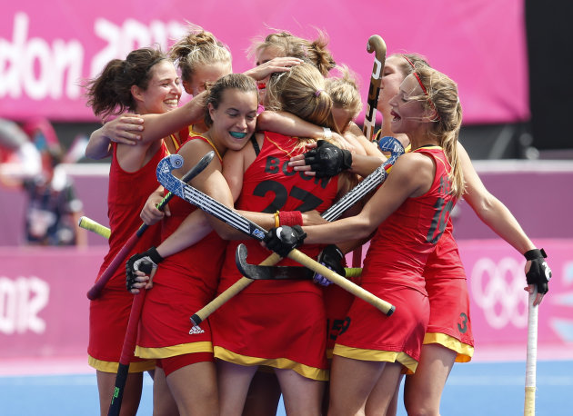 Belgium&#39;s players celebrate a goal scored by Jill Boon during their women&#39;s Group A hockey match against Japan at the London 2012 Olympic Games