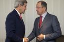 U.S. Secretary of State John Kerry, left and Russia's Foreign Minister Sergei Lavrov shake hands, during a photo opportunity, prior to their meeting, in Geneva, Switzerland, Saturday, Nov. 23, 2013. U.S. Secretary of State John Kerry and foreign ministers of other major powers joined Iran nuclear talks on Saturday, throwing their weight behind a diplomatic push to complete a deal after envoys reported progress on key issues blocking an interim agreement to curb the Iranian program in return for limited sanctions relief. (AP Photo/Carolyn Kaster, Pool)