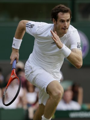Andy Murray of Britain runs to play a shot to Jerzy …