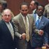 FILE - In this Oct. 3, 1995 file photo, O.J. Simpson, center, reacts as he is found not guilty of murdering his ex-wife Nicole Brown and her friend Ron Goldman, as members of his defense team, F. Lee Bailey, left, and Johnnie Cochran Jr., right, look on, in court in Los Angeles. The return of O.J. Simpson to a Las Vegas courtroom next Monday, May, 13,  will remind Americans of a tragedy that became a national obsession and in the process changed the country's attitude toward the justice system, the media and celebrity. The return of O.J. Simpson to a Las Vegas courtroom next Monday, May, 13,  will remind Americans of a tragedy that became a national obsession and in the process changed the country's attitude toward the justice system, the media and celebrity.(AP Photo/Pool, Myung J. Chun, file)