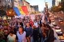 Protesters march for the fifteenth day of demonstrations on September 15, 2013 in Bucharest against RMGC