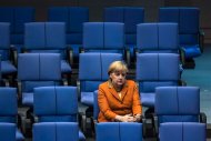 German Chancellor Angela Merkel attends a debate after delivering a government policy statement during a session of the Bundestag, the German lower house of parliament, in Berlin October 18, 2012. REUTERS/Thomas Peter