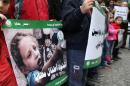 Activists hold a sit-in in solidarity with the Syrian besieged town of Madaya on January 8, 2016, outside the International Committee of the Red Cross (ICRC) headquarters in the Lebanese capital Beirut