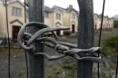 File photo of electrical cable used to secure a security fence surrounding Cnoc an Iuir, an empty and unsold housing development in the village of Drumshanbo