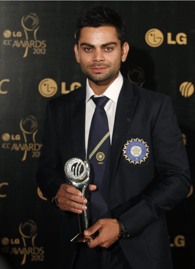 Kohli of India, winner of the ICC's ODI Cricketer of the Year Award, poses with the trophy during the ICC Awards in Colombo