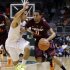 Miami's Shane Larkin (0) tries to steal the ball from Virginia Tech's Erick Green (11) during the first half of an NCAA college basketball game in Coral Gables, Fla., Wednesday, Feb. 27, 2013. (AP Photo/J Pat Carter)