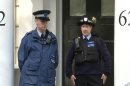 This photo taken from PA video shows police outside a house in Cadogan Place, Chelsea after the body of Eva Rausing, a member of the family behind the Tetra-Pak drinks carton empire and one of the richest women in Britain was found, Tuesday July 10, 2012. Eva Rausing, one of Britain's richest women, was found dead in her west London home and a man has been arrested in connection with her death, British police said Tuesday. Rausing, 48, was the American-born wife of Hans Kristian Rausing, heir to the multibillion-dollar TetraPak packaging fortune. They have both had long-running and often public battles against addiction. (AP Photo/PA Video, Leanne Rinne) UNITED KINGDOM OUT NO SALES NO ARCHIVE