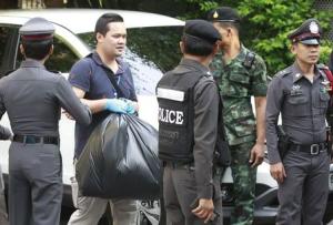 Thai Royal Police officials remove evidence from the &hellip;