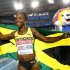 Campbell-Brown holds her national flag after winning the women's 200 metres final at the IAAF World Championships in Daegu